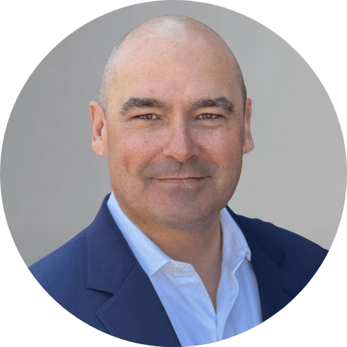 Headshot of Derek Dean, Chief Executive Officer of Aurora Payments.