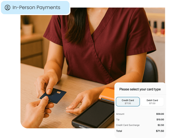 A client makes a payment with a credit card at a nail salon's front desk, illustrating the in-person point-of-sale system.